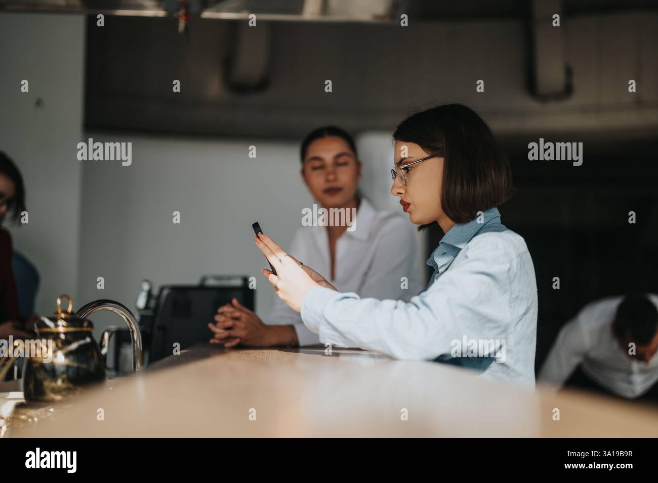 Multicultural business workers enjoying a break at the office Stock Photo