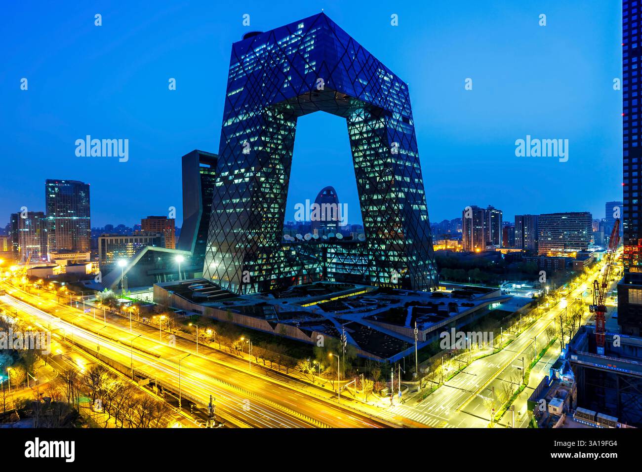 Beijing, China, Beijing central business district CBD skyline with the headquarters of Chinese television CCTV at night in Beijing, China. Stock Photo