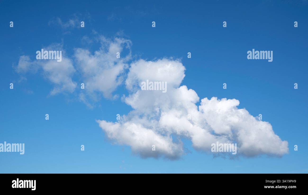 View to sky with cumulus clouds Stock Photo - Alamy