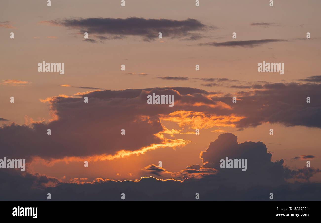 Evening sky with pastel-colored clouds Stock Photo