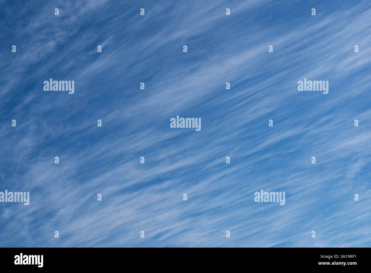 White clouds on a blue winter sky Stock Photo