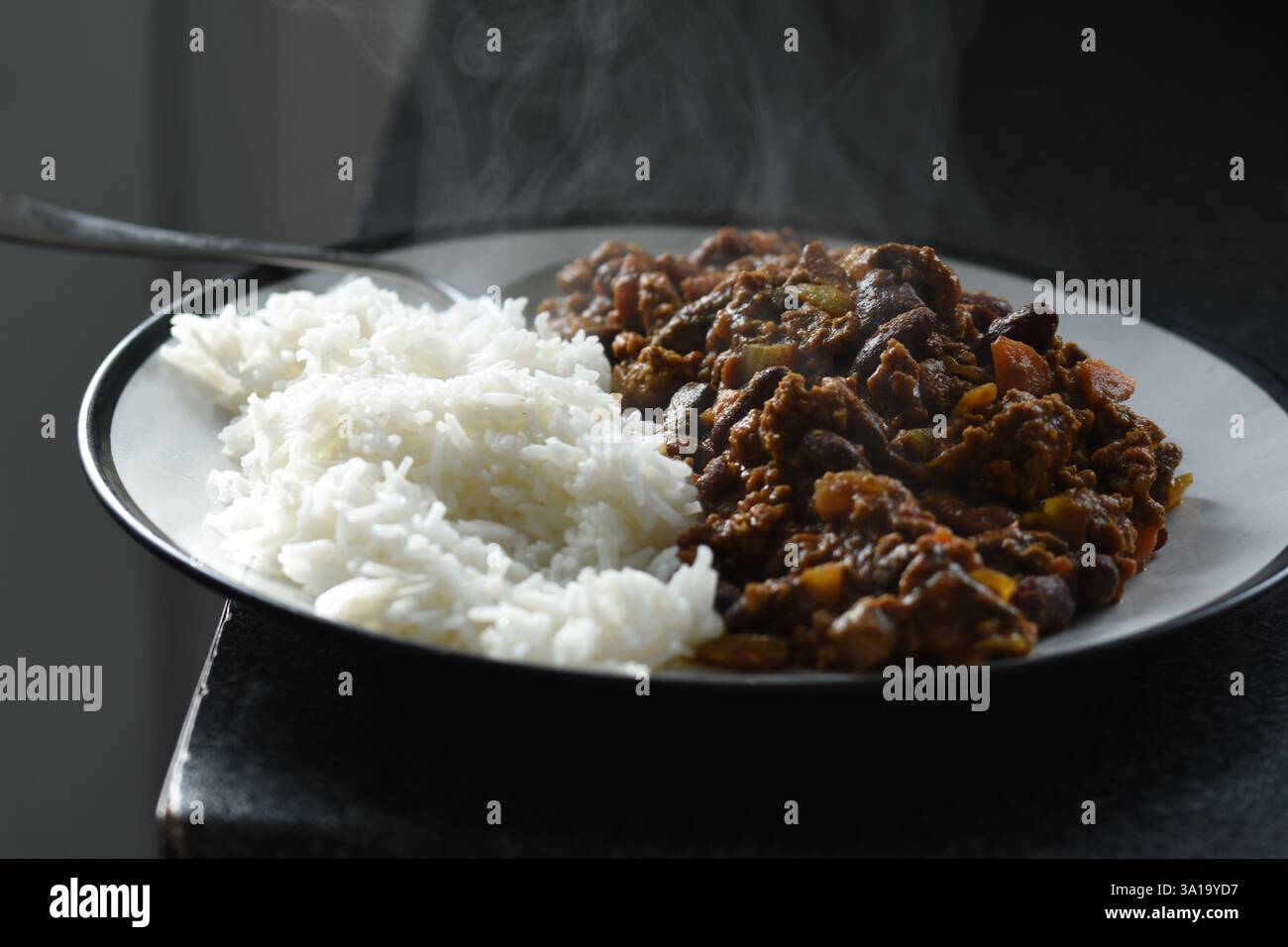 Chili con carne with basmati rice Stock Photo - Alamy