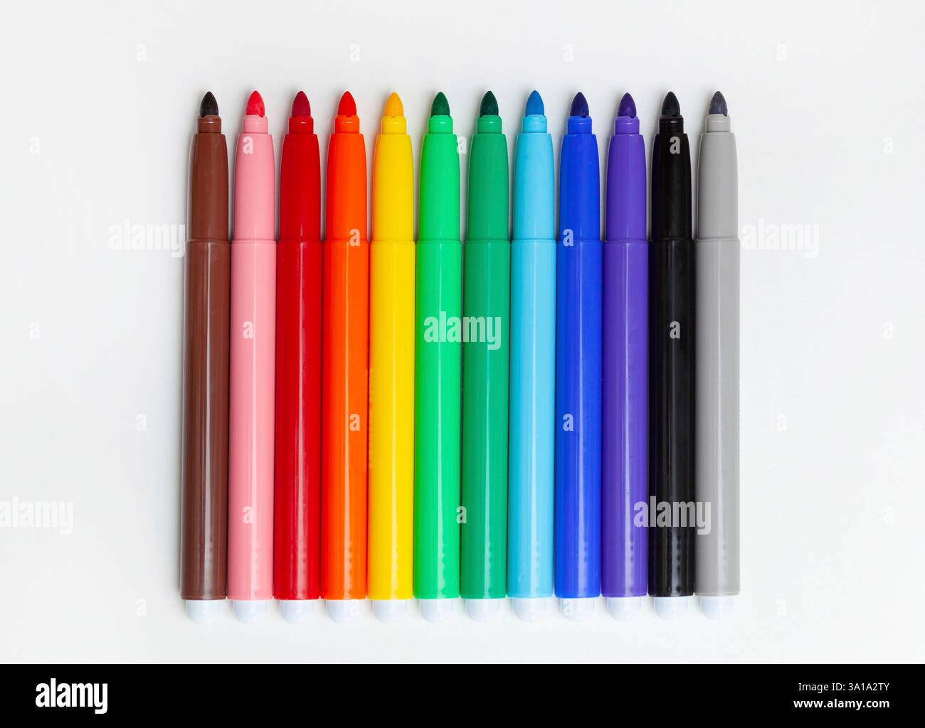 Multi-colored felt-tip pens, markers on a white isolated background. Stock Photo