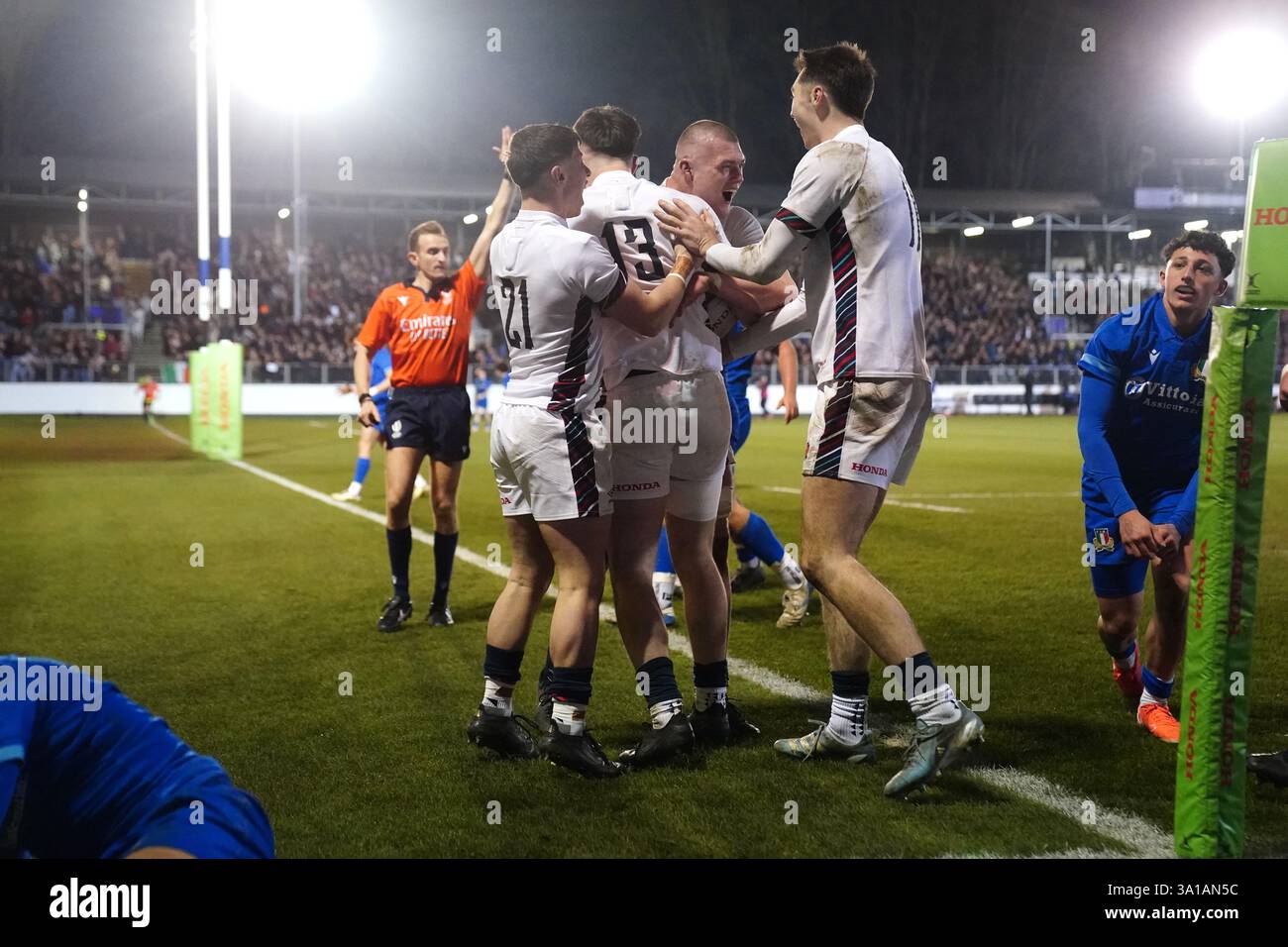 England's Angus Hall (centre) celebrates scoring their side's fourth ...