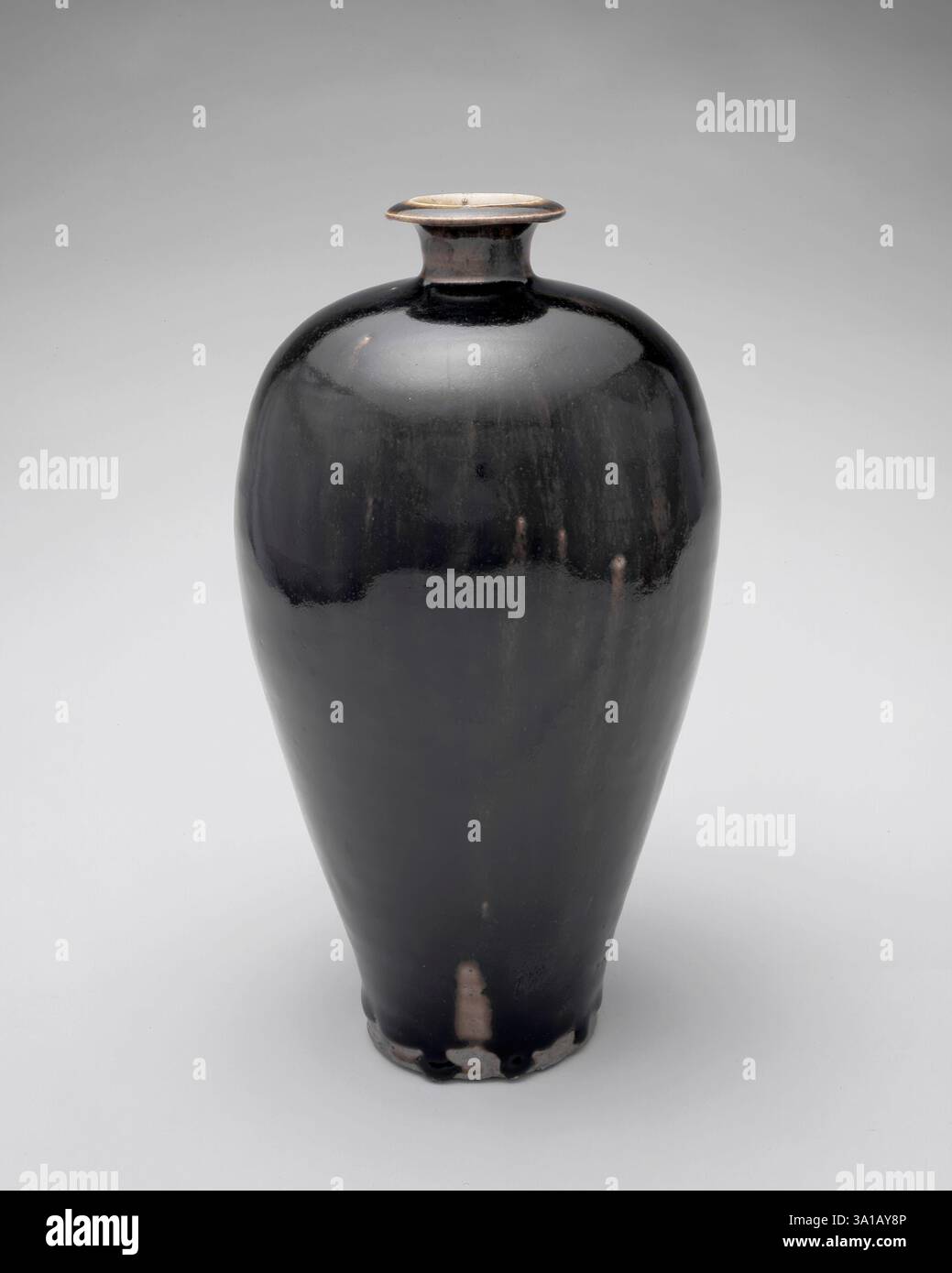 Black vase, about 1100. Stock Photo