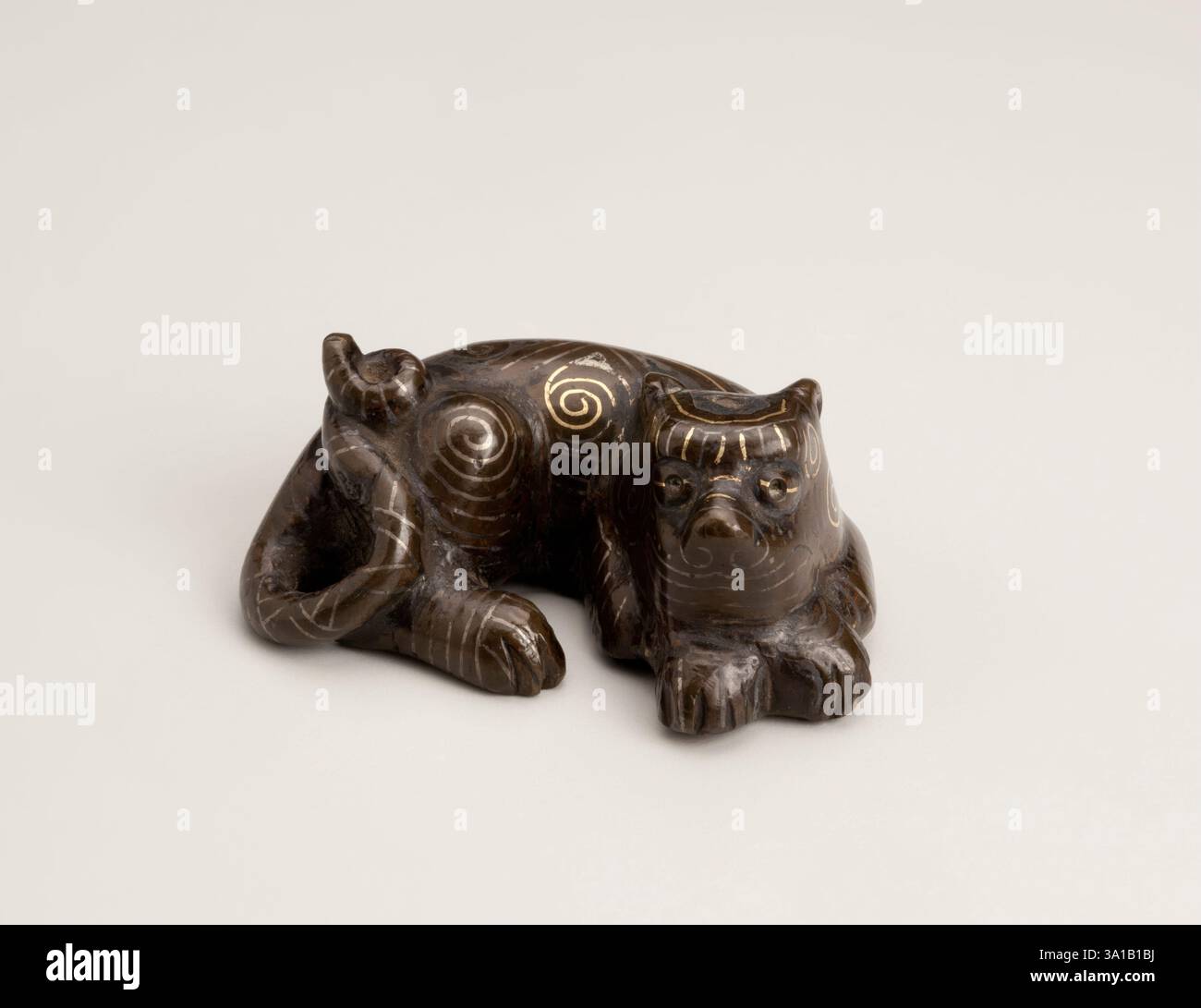 Reclining tiger, 960-1279. Stock Photo