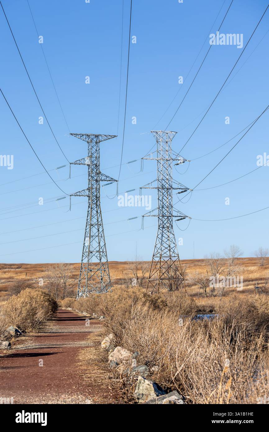 Two electrical transmission towers standing hi-res stock photography ...