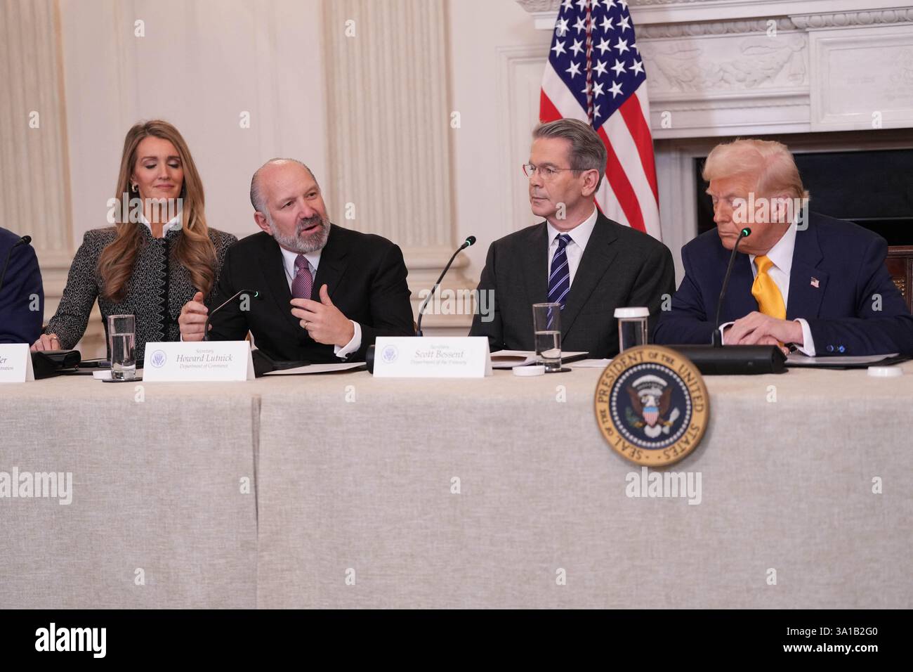 Washington, United States. 07th Mar, 2025. United States Secretary of  Commerce Howard Lutnick, second left, makes remarks at The White House  Digital Assets (Crypto) Summit in the State Dining Room of the