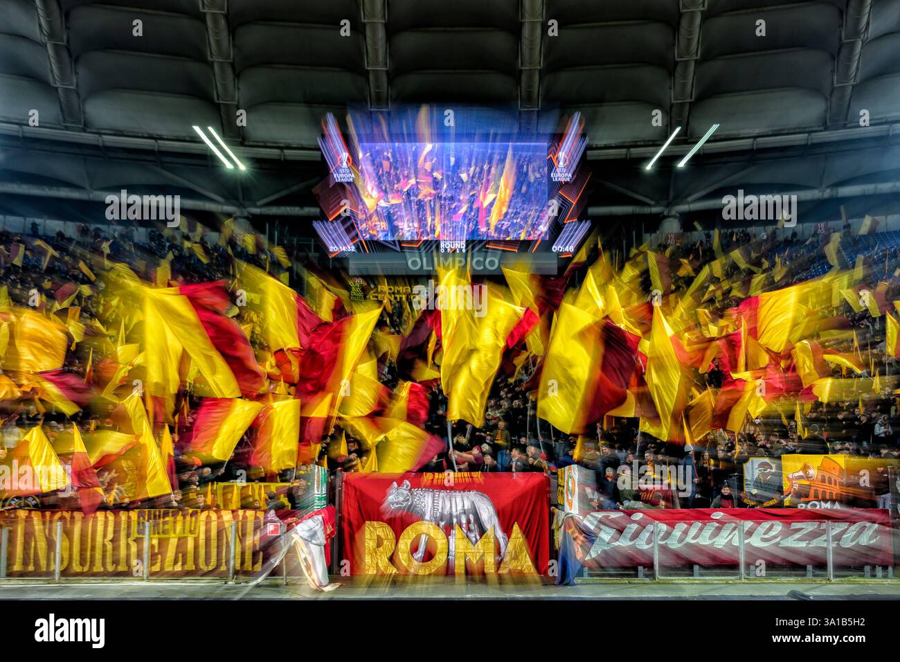 Roma fans cheer on during the Europa League round of 16 football match ...
