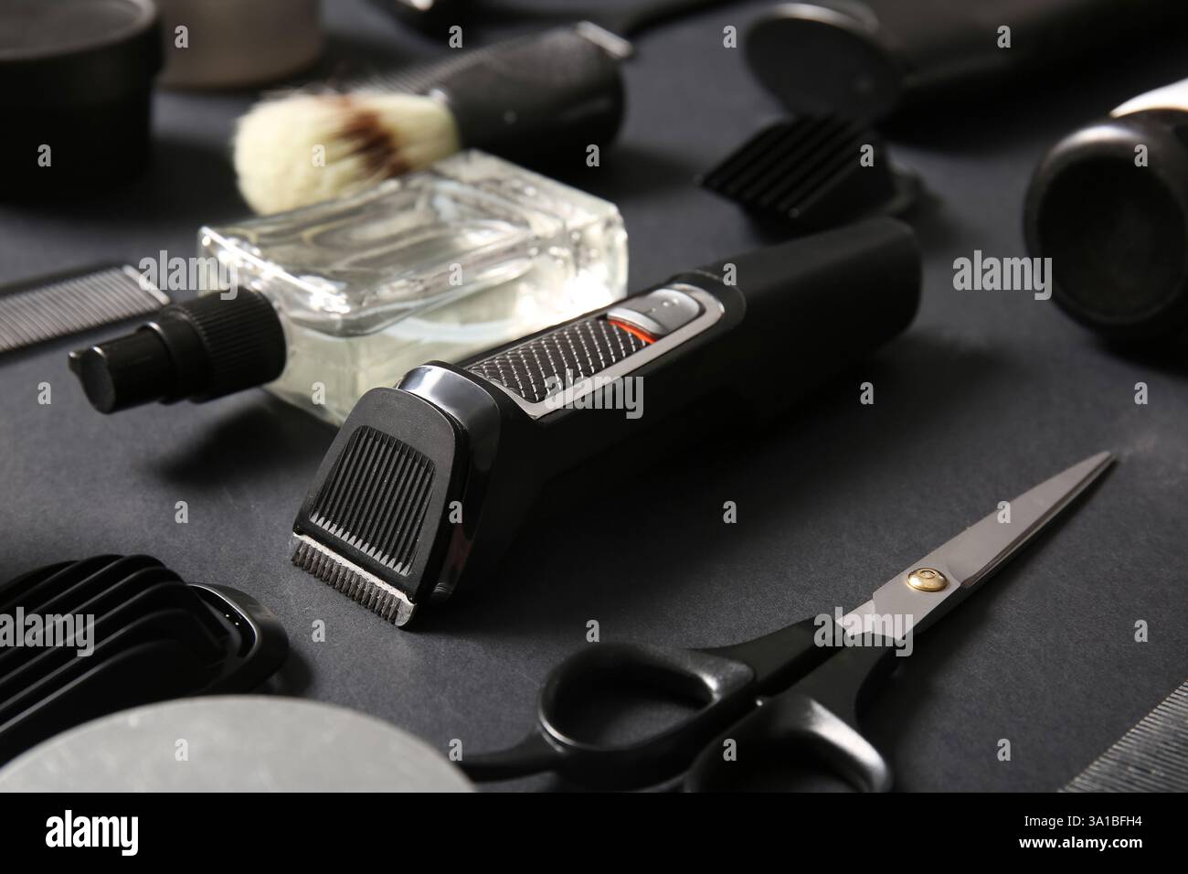Modern trimmer and shaving accessories on black background Stock Photo