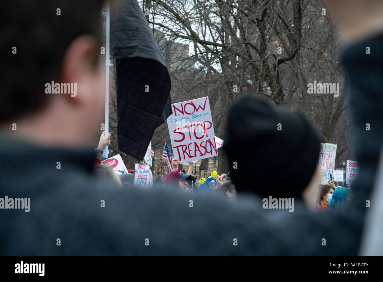 People protesting Donald Trump and Elon Musk at the Boston Commons in ...