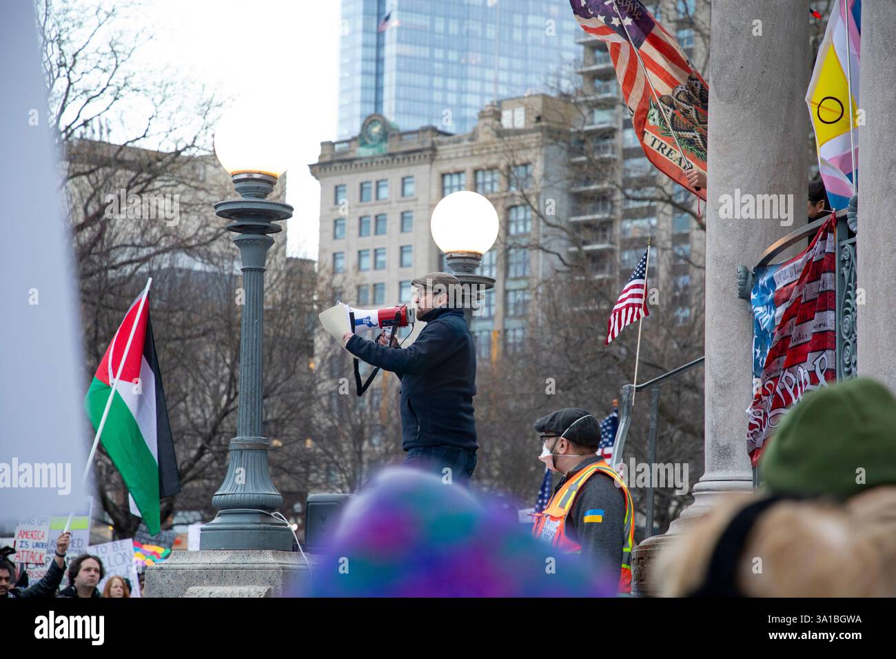 People protesting Donald Trump and Elon Musk at the Boston Commons in ...