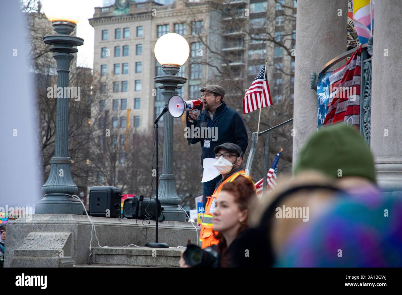 People protesting Donald Trump and Elon Musk at the Boston Commons in ...