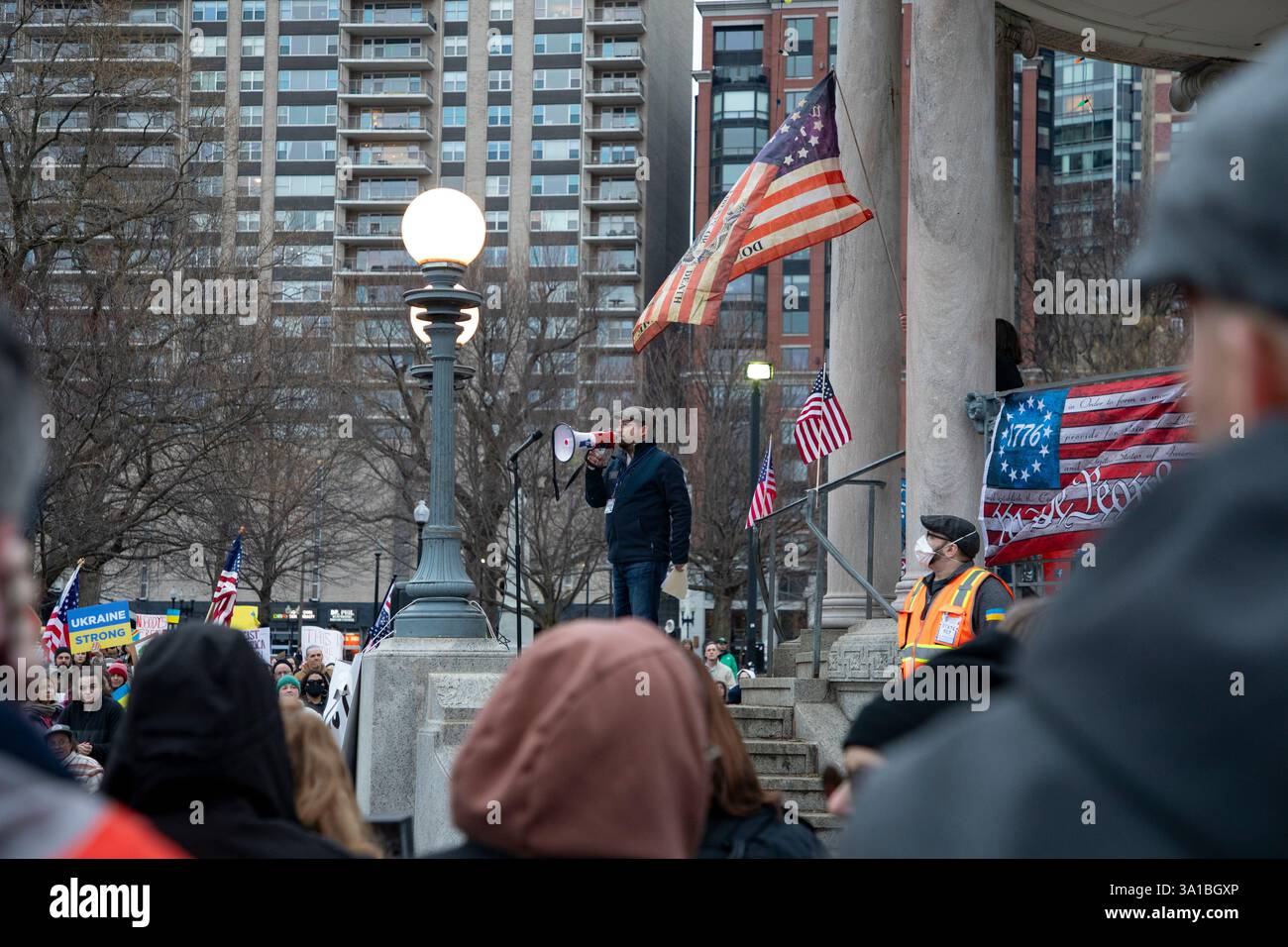 People protesting Donald Trump and Elon Musk at the Boston Commons in ...