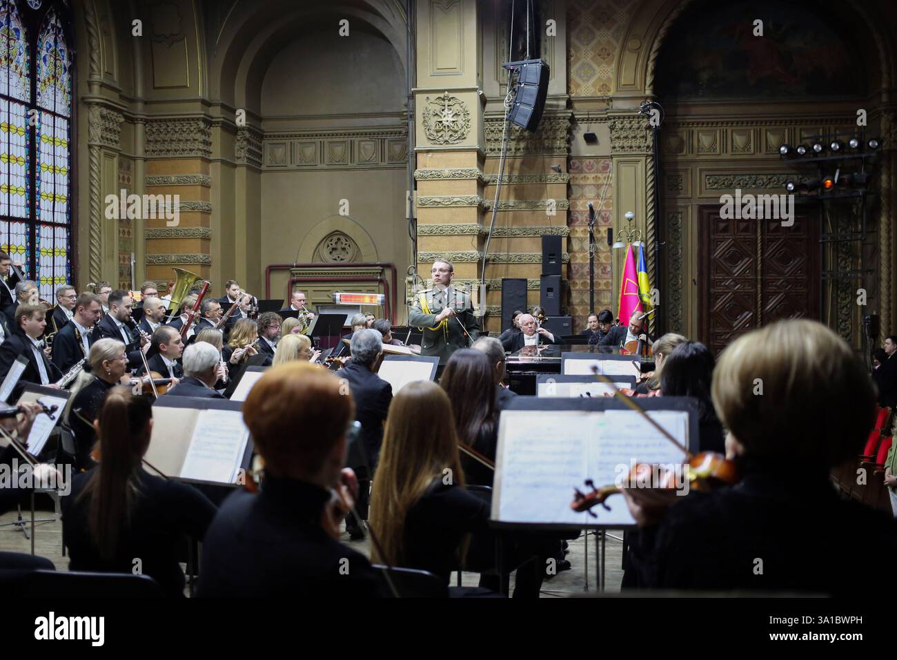 Conductor Serhii Lykhomanenko ( in the center) and National Odessa ...