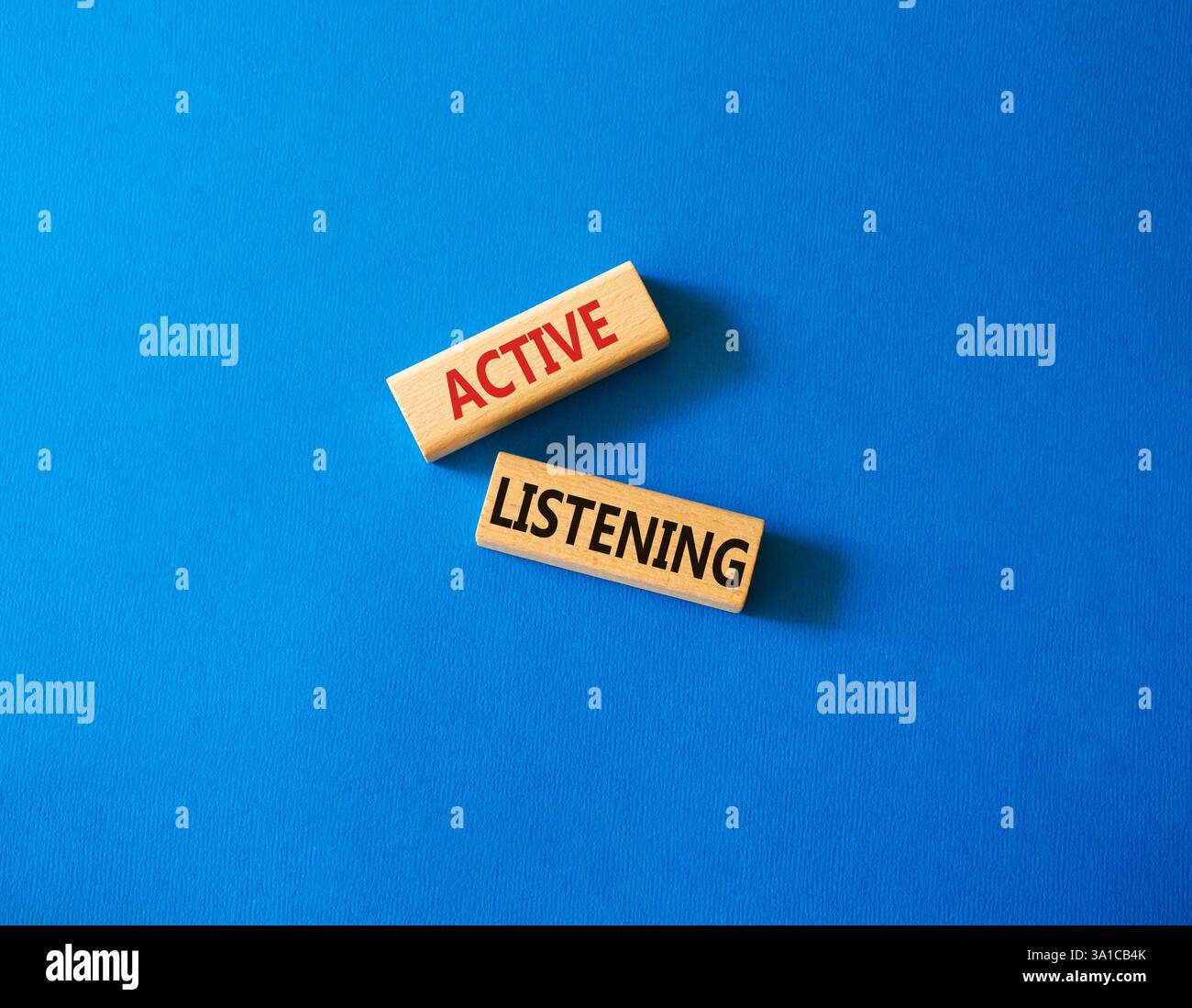 Active listening symbol. Wooden blocks with words Active listening ...