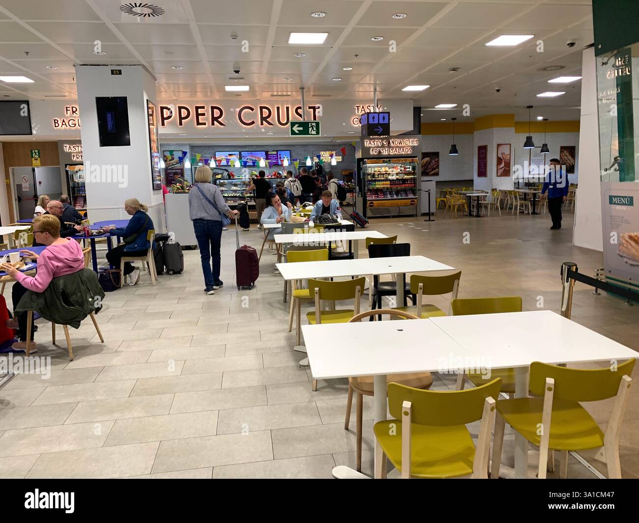 Tenerife Airport shop shopping food restaurant people sit sat floor waiting inside emergency exit flying hot food beer drink signs sign baggage glass - Smartphone Captured Stock Image