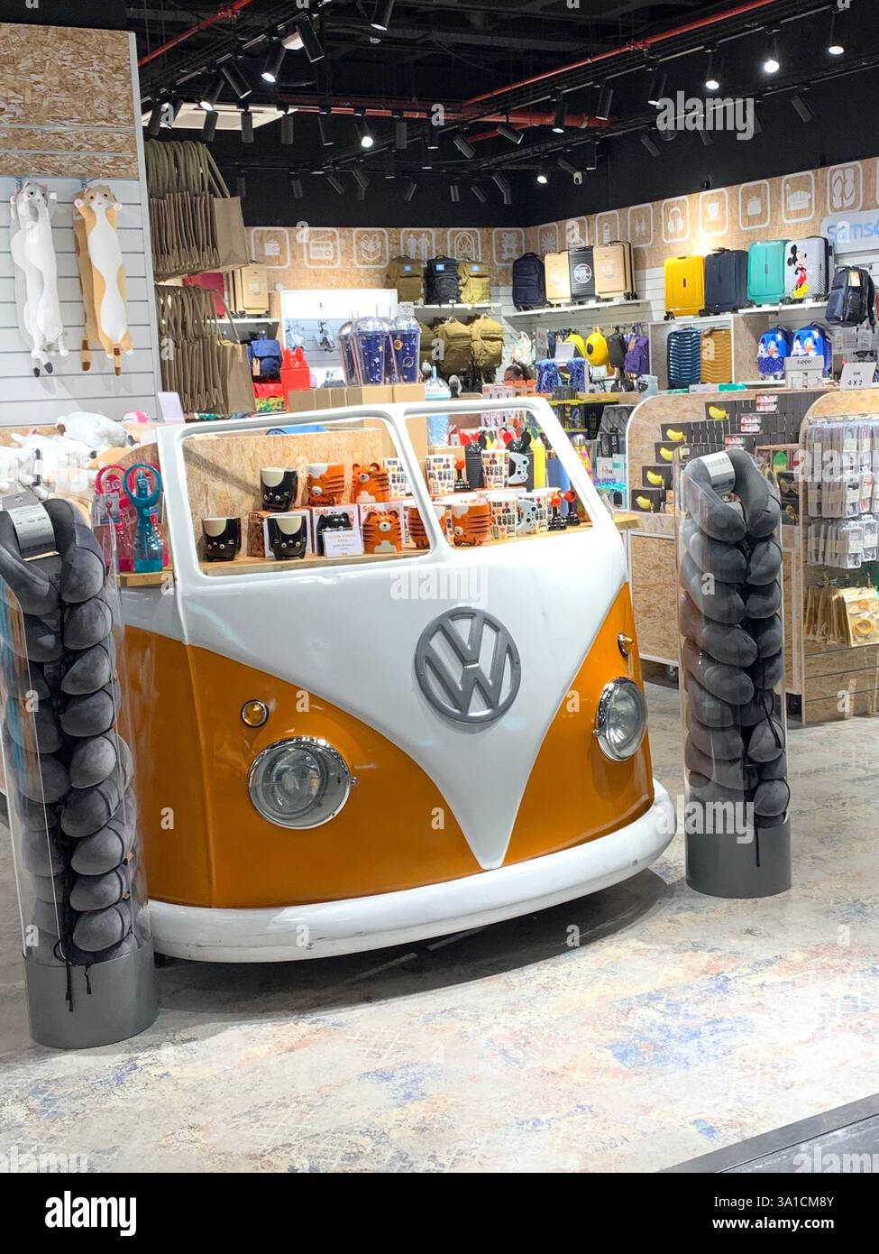Tenerife Airport shop shopping food restaurant people sit sat floor waiting van emergency exit flying hot food beer drink signs sign VW Volkswagen - Smartphone Captured Stock Image