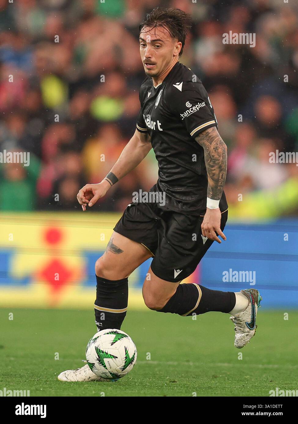 Joao Mendes of Vitoria Guimaraes SC  during the UEFA Conference League, round of 16 match, between Real Betis and Vitoria Guimaraes played at Benito Villamarin Stadium on March 06, 2025 in Sevilla, Spain. (Photo by Antonio Pozo / PRESSINPHOTO) Stock Photo