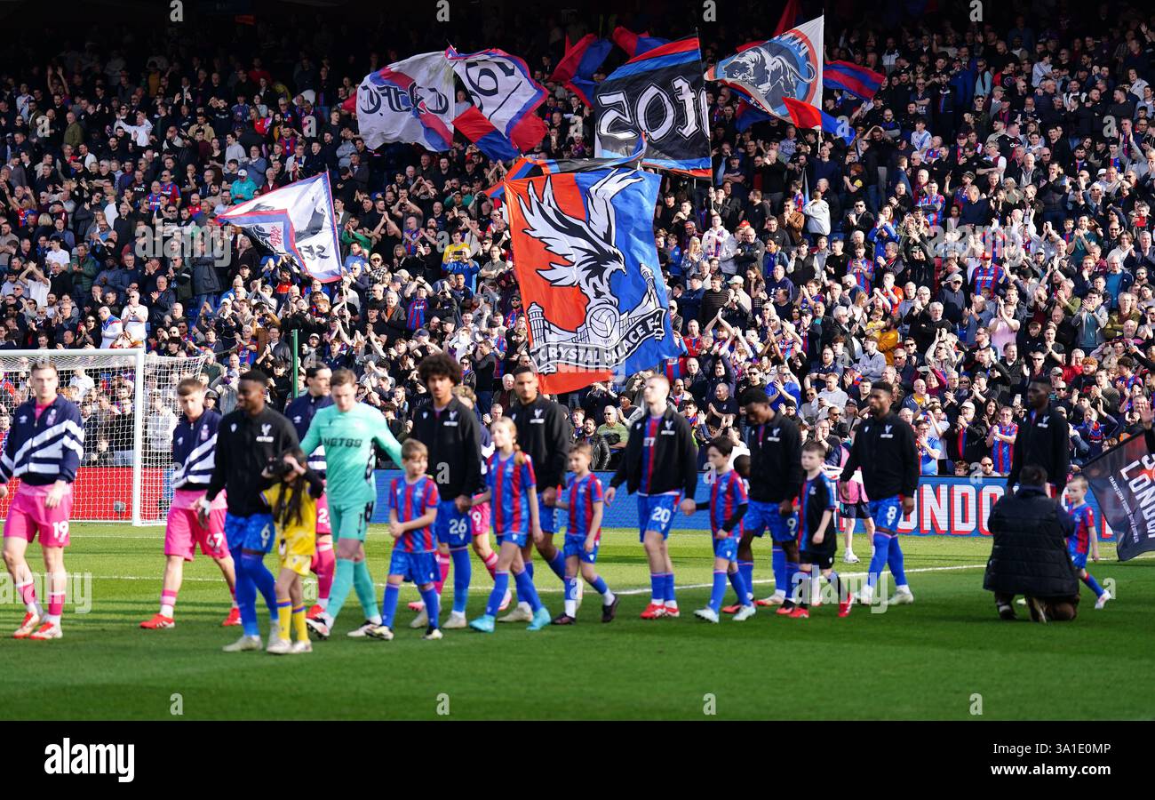 Crystal Palace fans show their support as the players walk out before ...