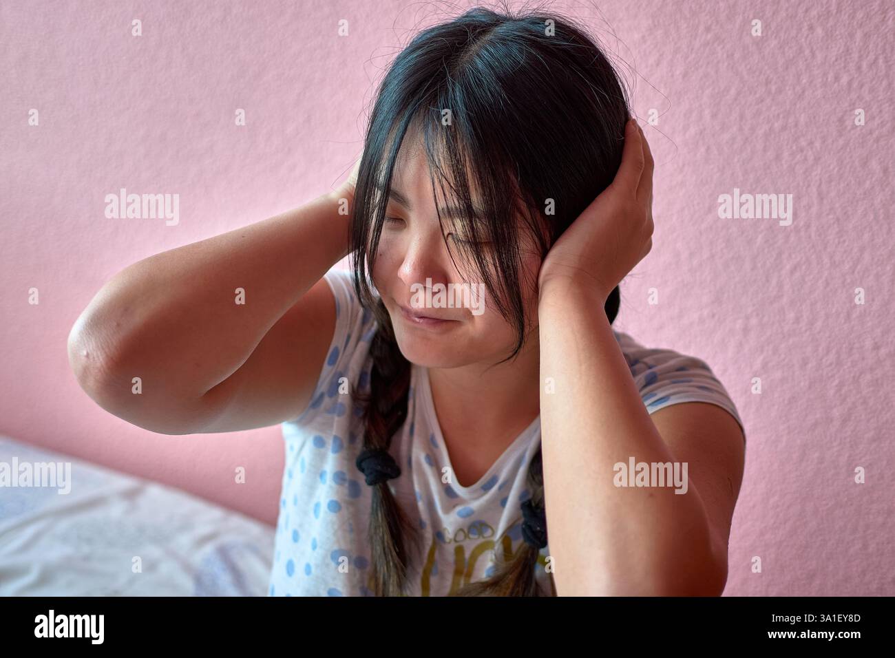 a-young-chinese-woman-with-autism-in-a-moment-of-introspection-gazing
