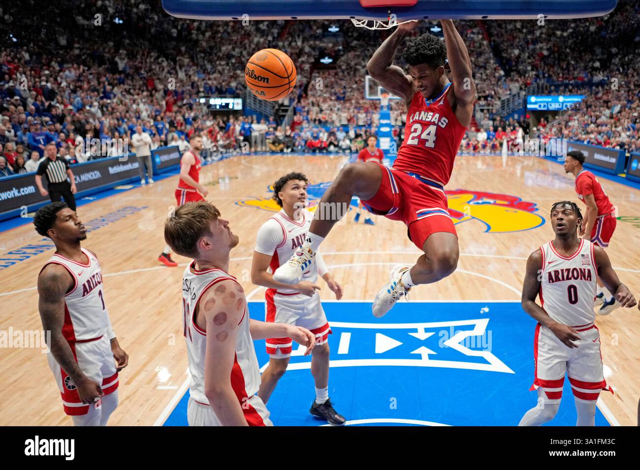 Kansas Dunks Kansas forward KJ Adams Jr. (24) dunks the ball during the first half ...