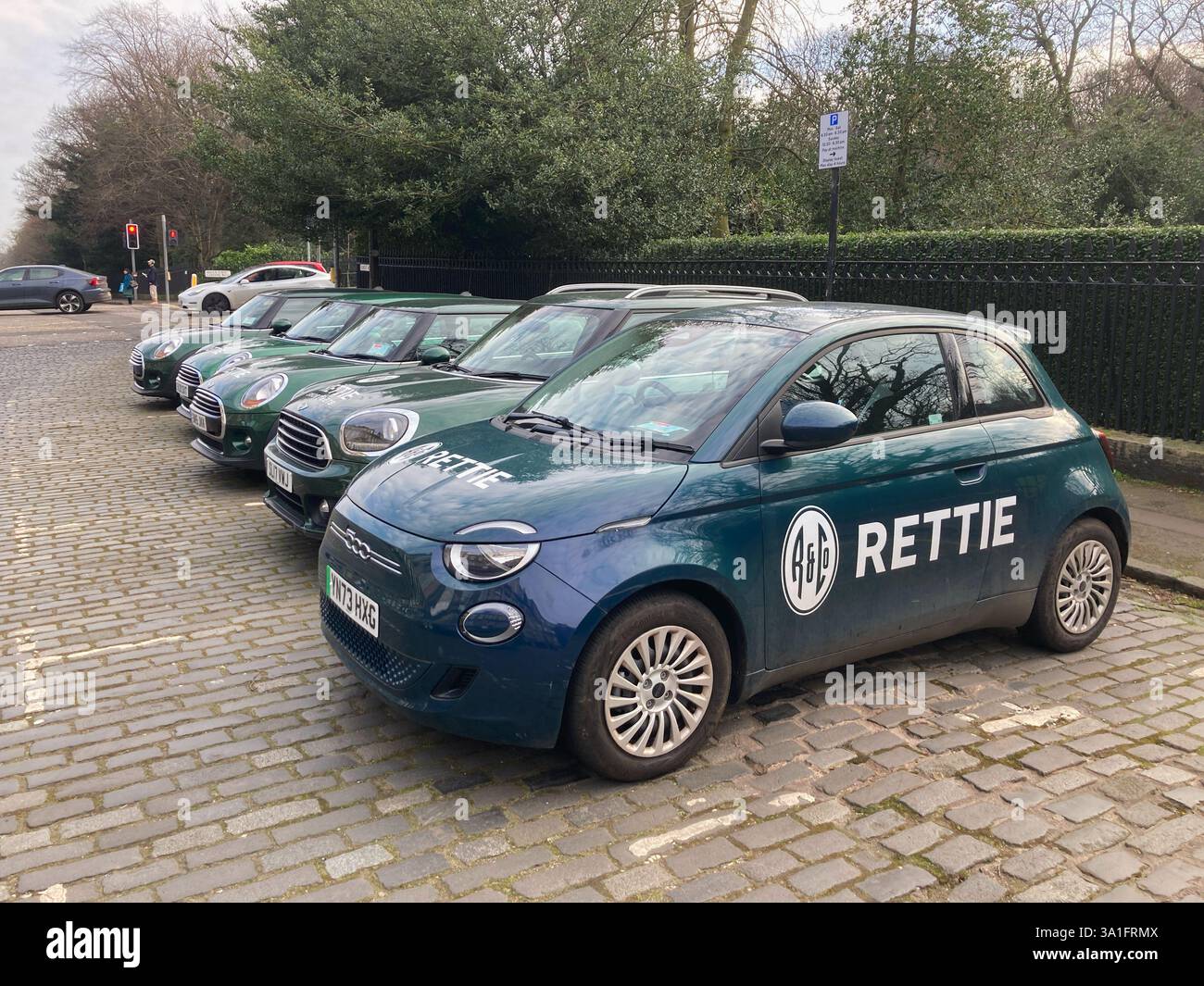Rettie & Co. Real Estate Agent, pool cars parked up in the New Town Heriot Row, Edinburgh, Scotland - Smartphone Captured Stock Image