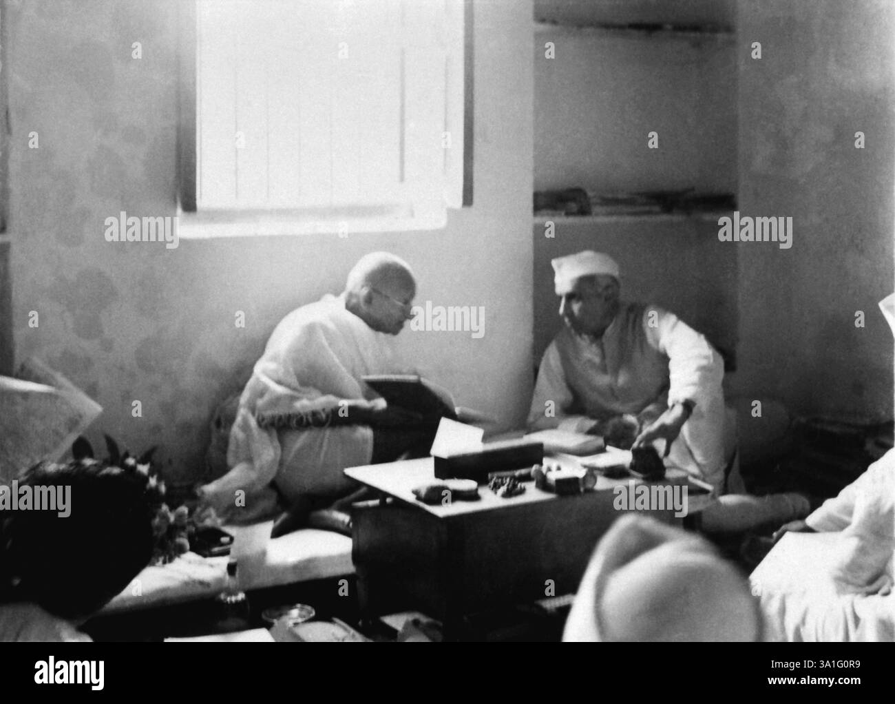 Mahatma Gandhi talking with Jawaharlal Nehru at Bhangi Colony in Delhi ...