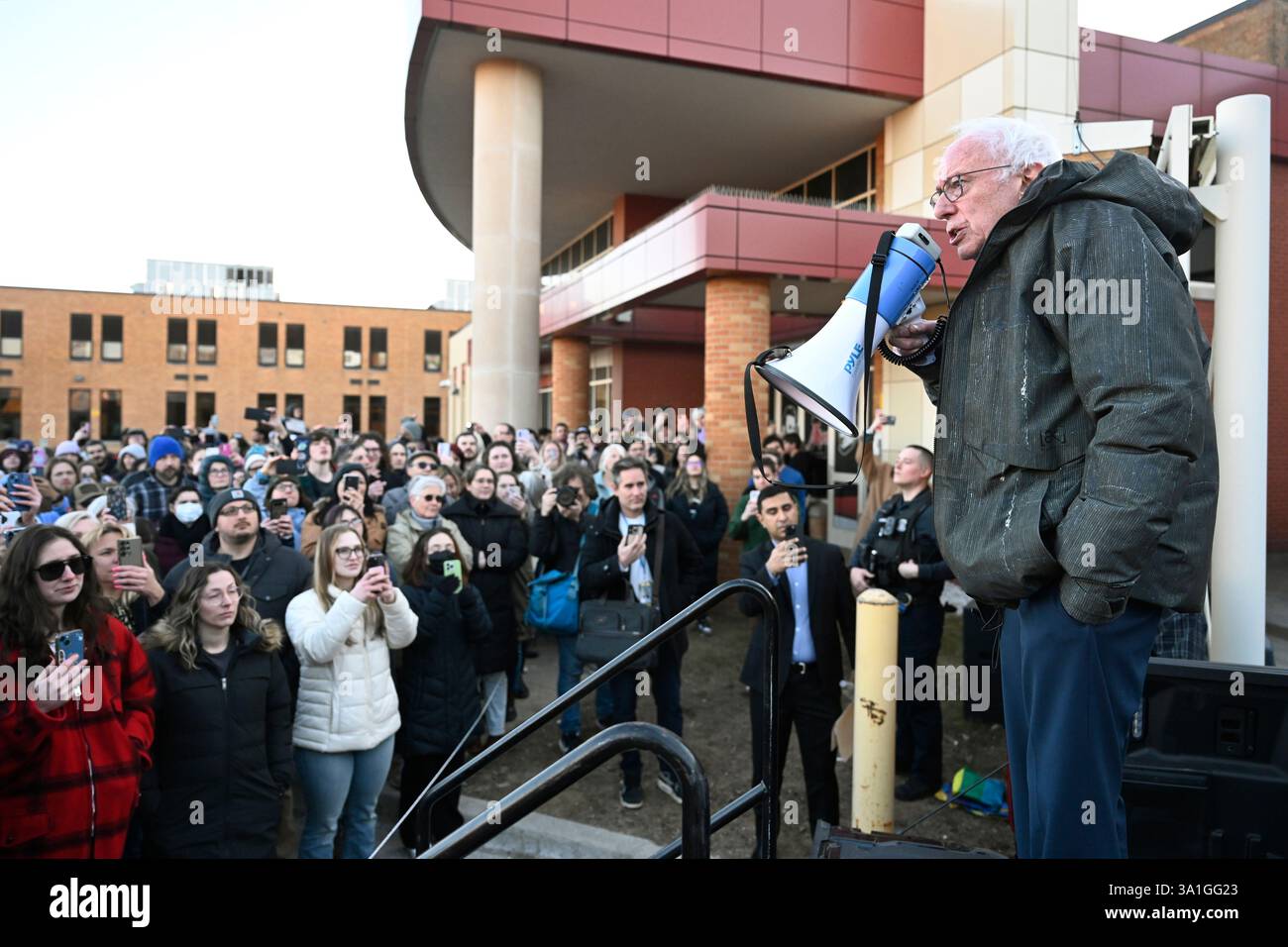 Sen. Bernie Sanders, I-Vt., right, speaks to an overflow crowd outside ...