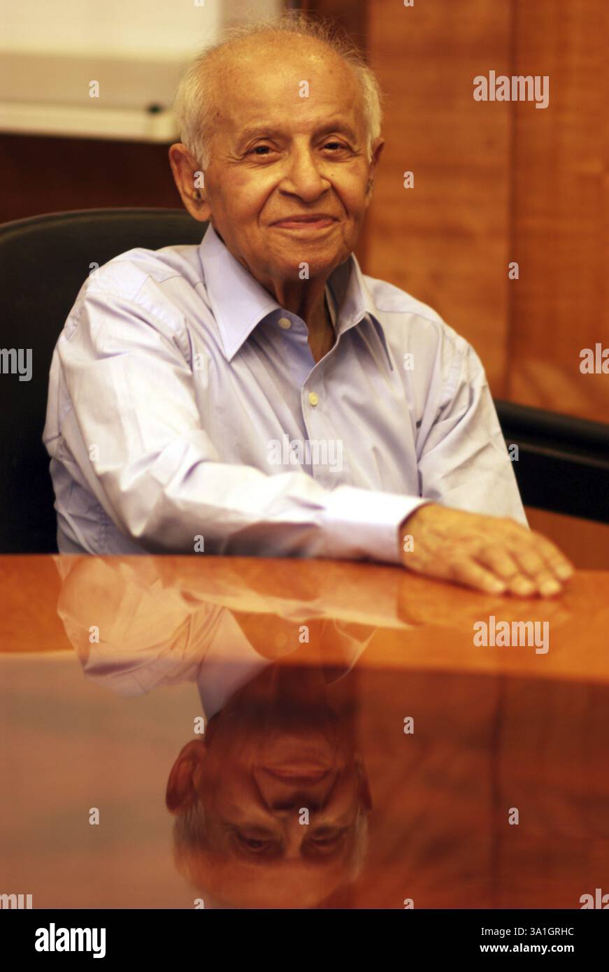 Dr L H Hiranandani renowned cardiologist sitting in his of Bombay ...