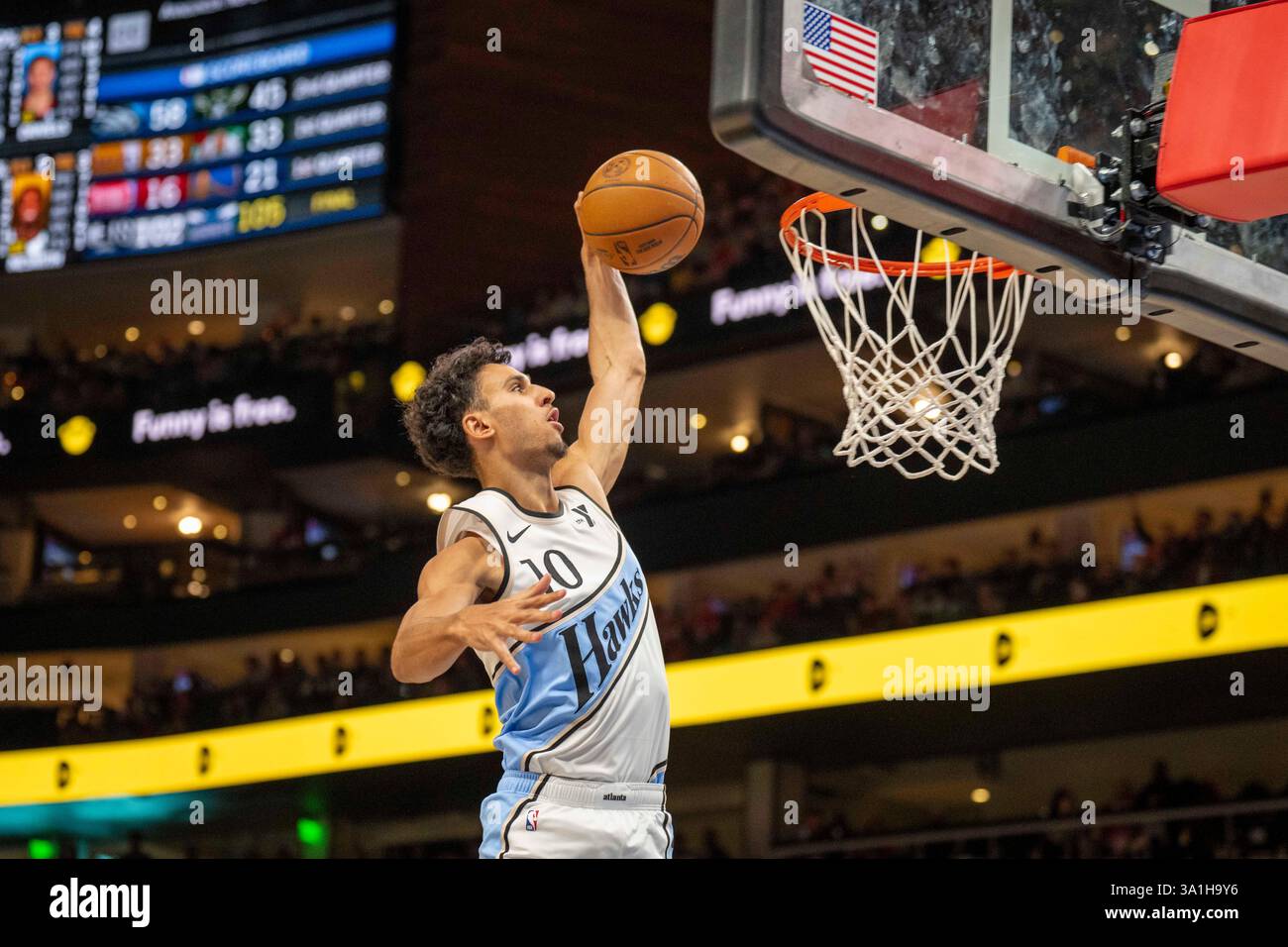 Atlanta Hawks forward Zaccharie Risacher slamdunks during the second
