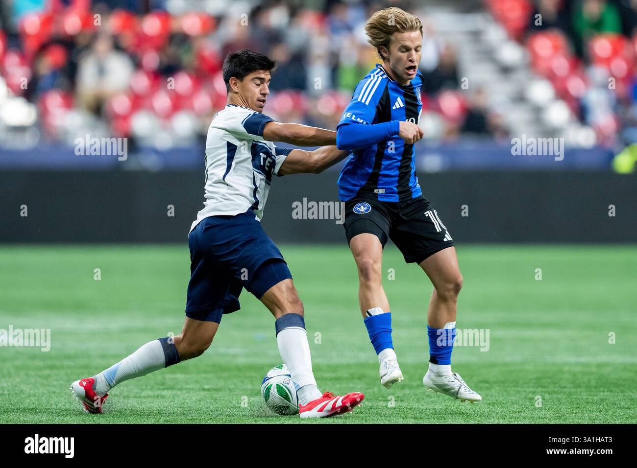Laborda Vancouver Whitecaps' Mathias Laborda, left, and CF Montreal's Bryce ...
