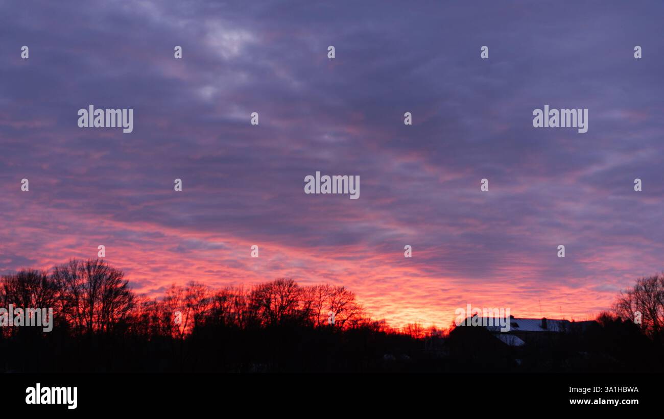 Crimson dawn fiery sky hi-res stock photography and images - Alamy