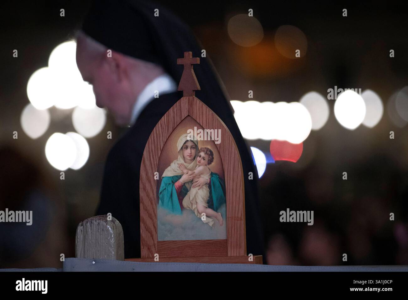 Vatican City, Vatican, 8 march 2025. Faithful pray during a rosary