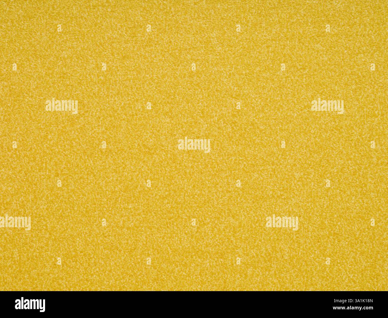 Vibrant yellow tones dance across the textured paper, embodying warmth, energy, and cheerful brightness Stock Photo