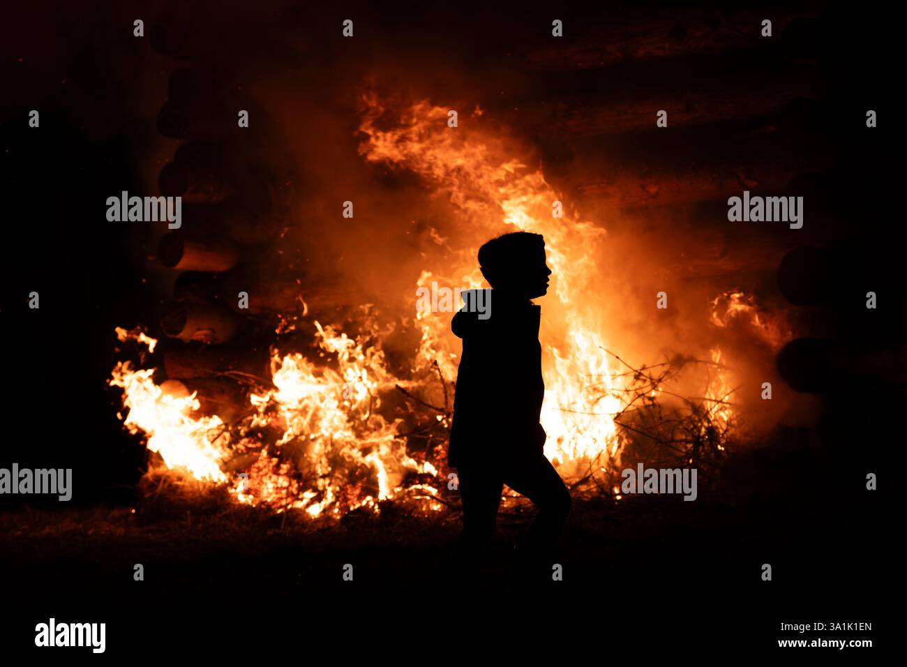 Rottweil, Germany. 08th Mar, 2025. A sparking fire burns on a mountain ...