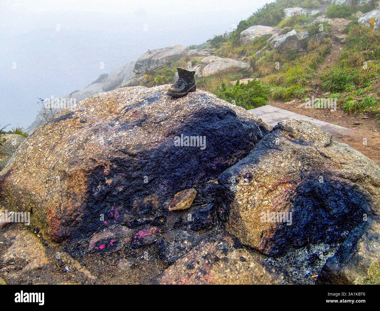 Cabo Finisterre, Galicia , Spain. Fireplace at Cap Finisterre in Galicia where pilgrims burn their shoes at the end of their journey on the Camino de Stock Photo