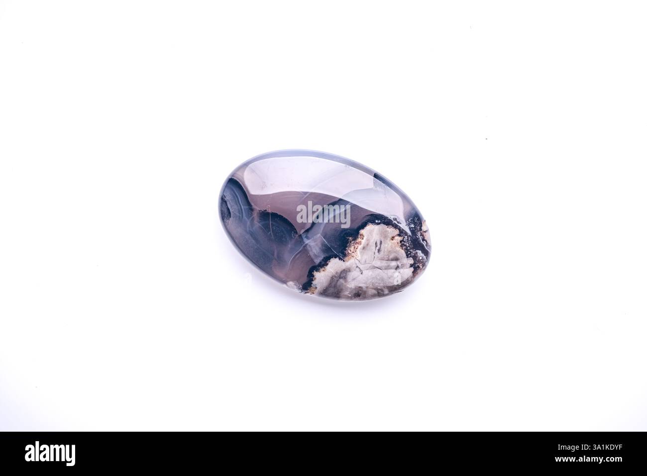 Single polished dull Volcano Agate isolated on white background Stock Photo