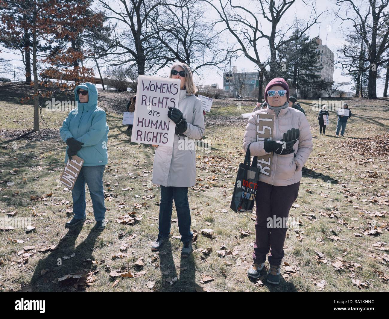 Equal rights protesters at the International Women's Day Rally in Flint Michigan USA, March 8 2025 - Smartphone Captured Stock Image