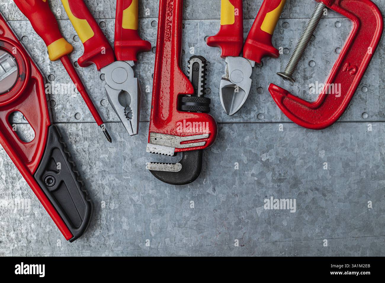 Red Construction Tools On Metalic Background Stock Photo - Alamy