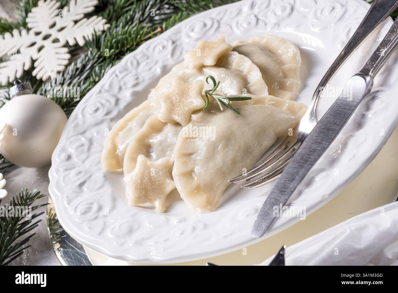 Polish style dumplings filled with sauerkraut and mushrooms Stock Photo