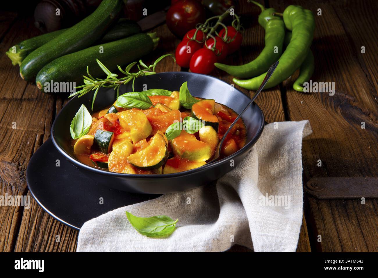 Vegetarische ratatouille mit frischem gemuese und kraeutern Stock Photo ... Vegetarische ratatouille mit frischem gemuese und kraeutern Stock Photo ...