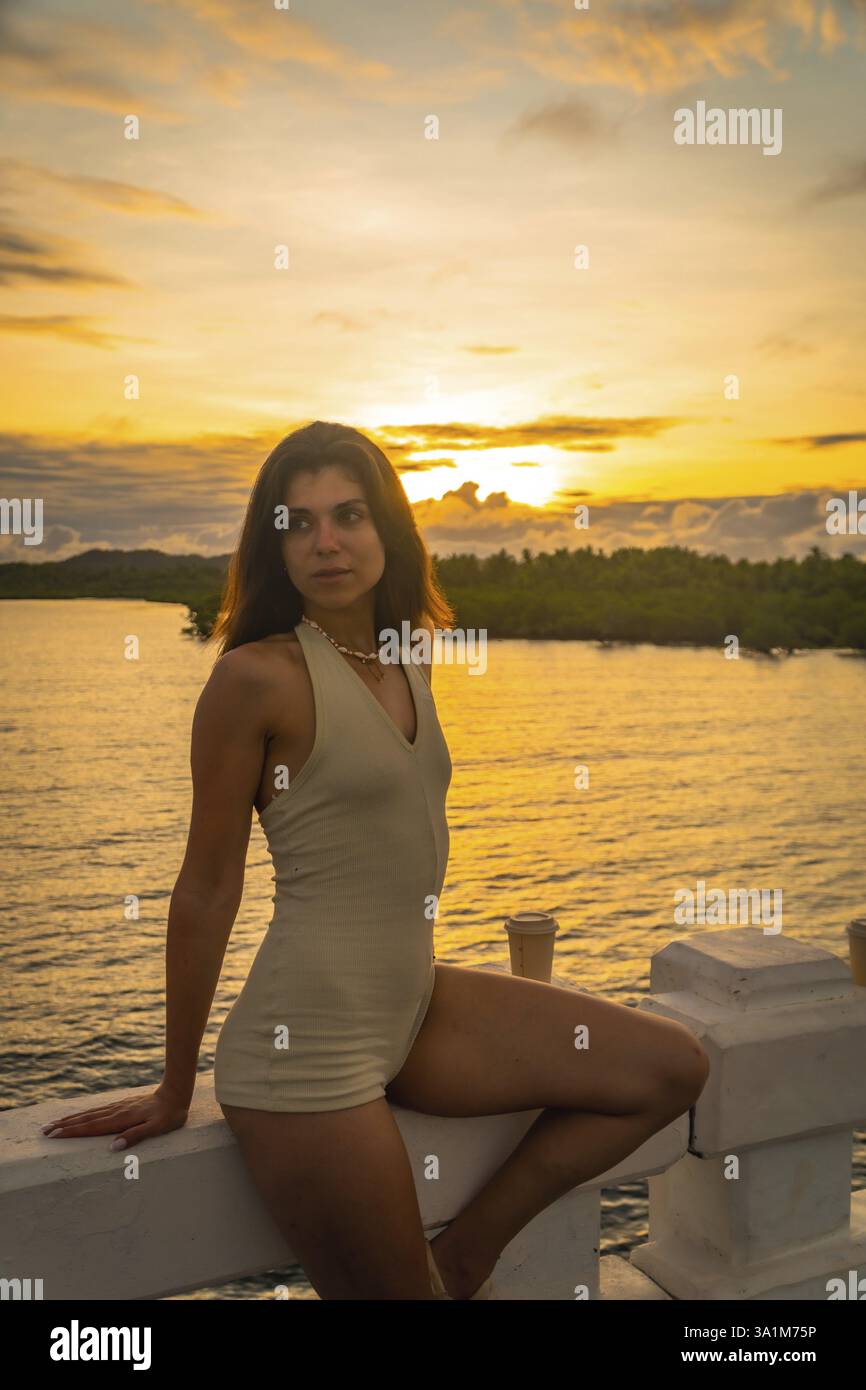 Merry woman admiring sunset sky hi-res stock photography and images - Alamy