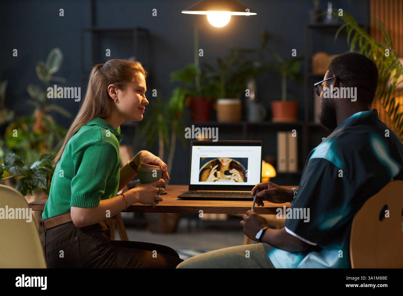 Colleagues Working In Team In Office Stock Photo