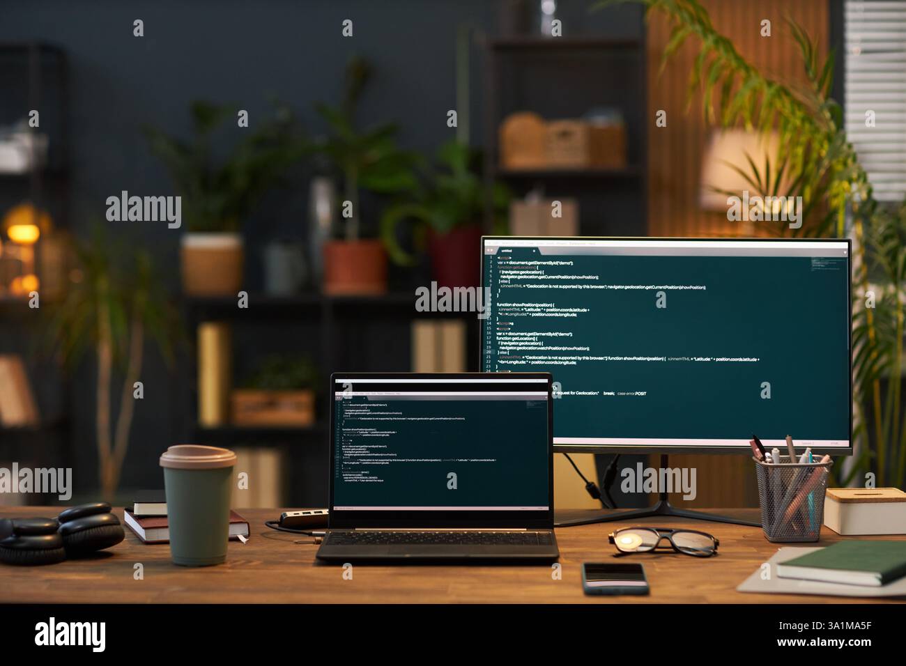 Workplace Of Programmer With Computers In Office Stock Photo