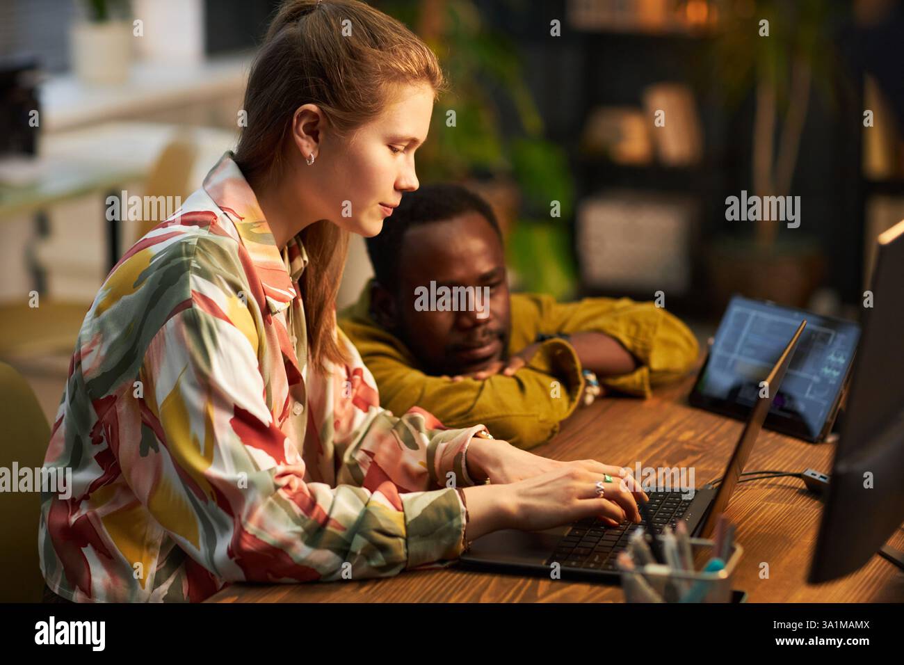 Programmer Working With Metadata On Laptop Stock Photo