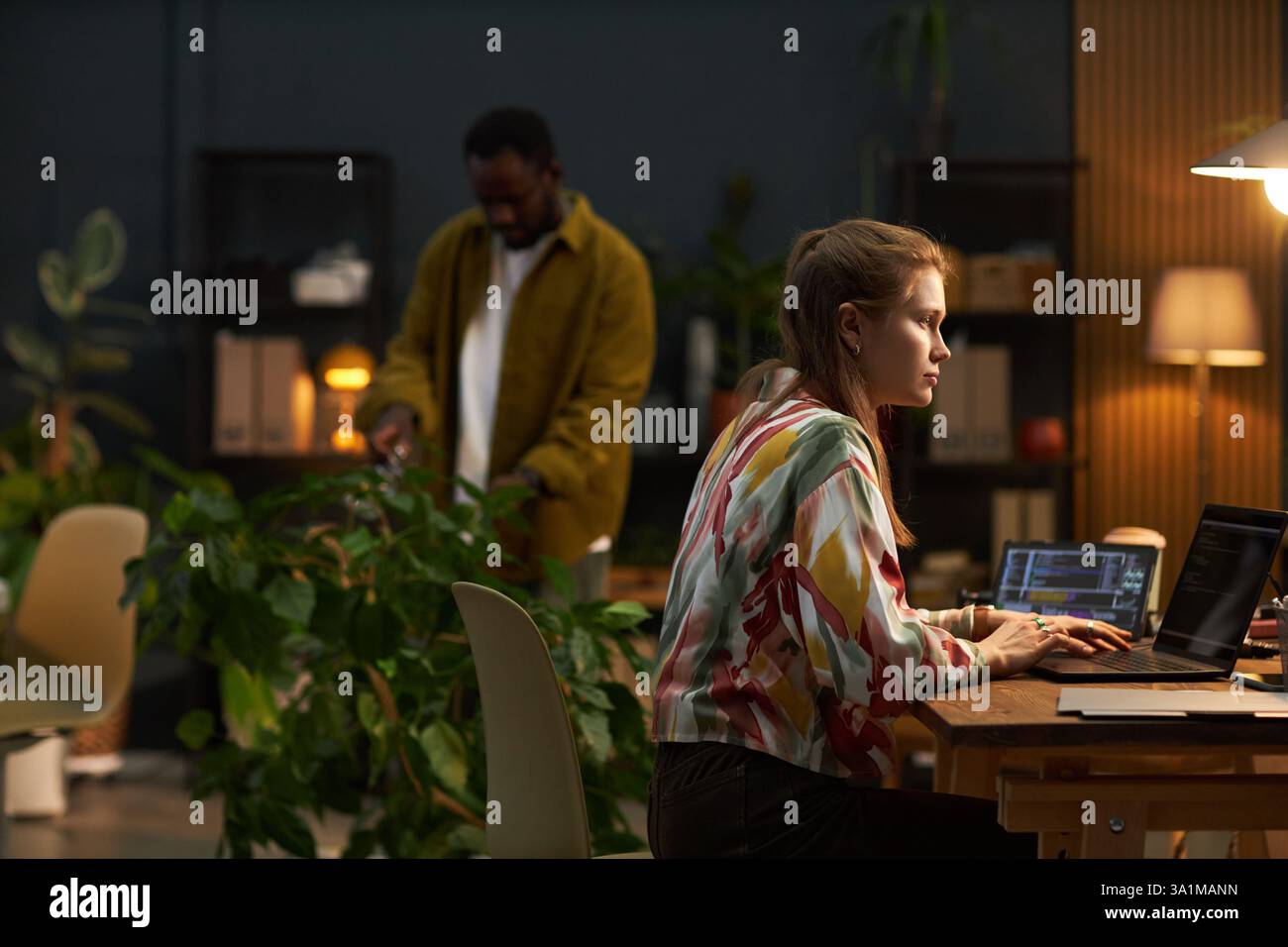 Woman Working With Security Codes On Computer Stock Photo