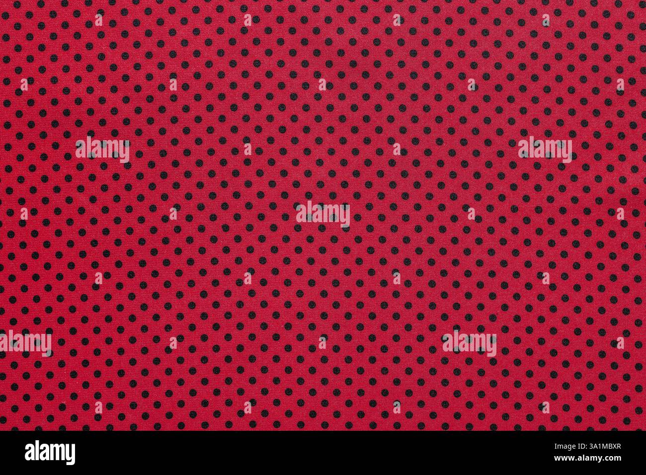 Pink polka-dot cotton table cloth Stock Photo