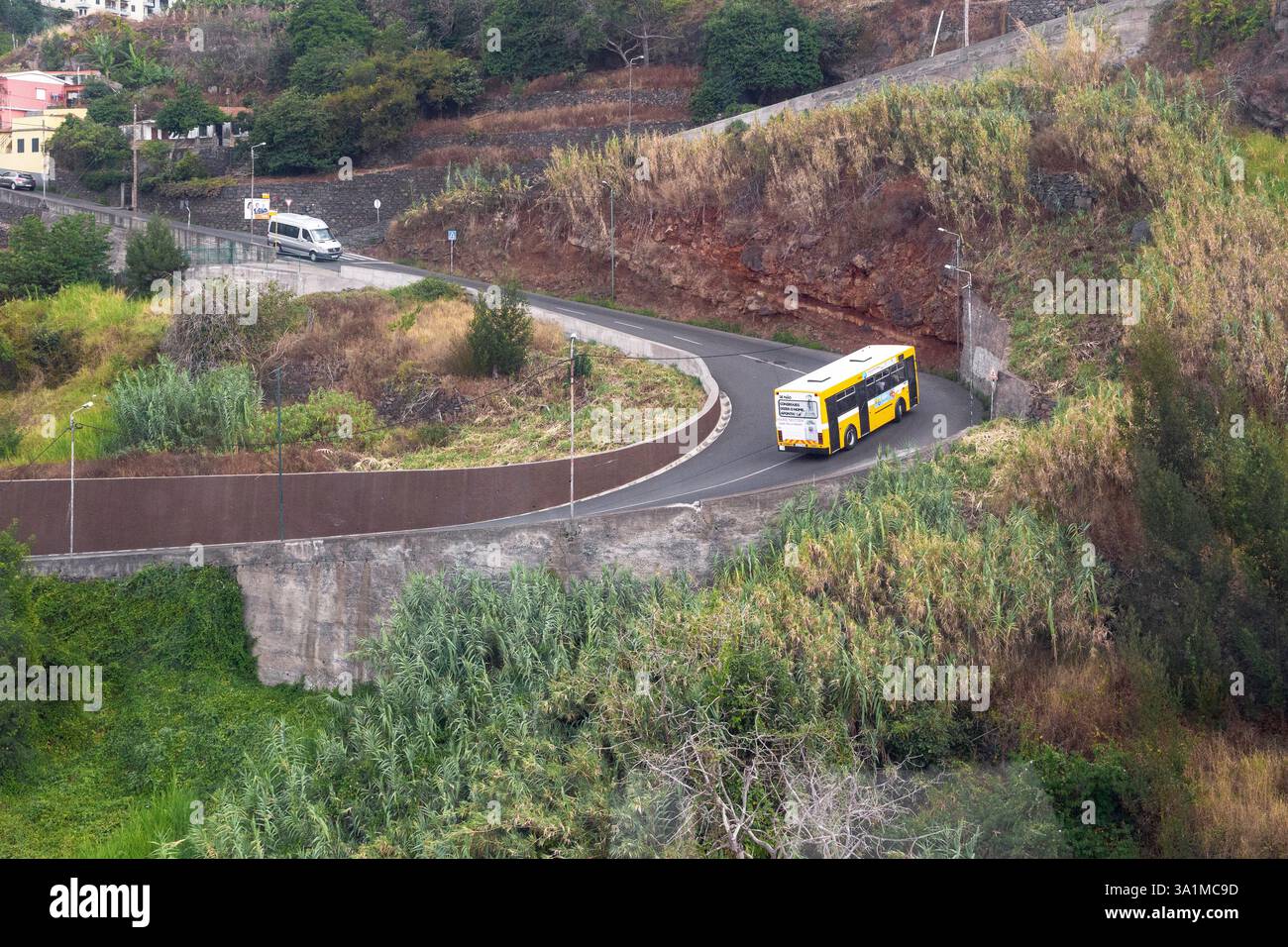 FUNCHAL, PORTUGAL - AUGUST 24, 2021: This is a steep serpentine on a city mountain street. Stock Photo