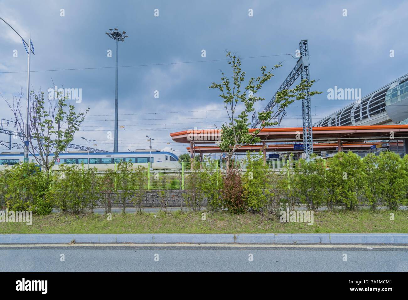 Osong, South Korea, July 23, 2019: Train leaving platform at Osong railway station located in Cheongwon county designed by HyeWonKaci Architects. For Stock Photo